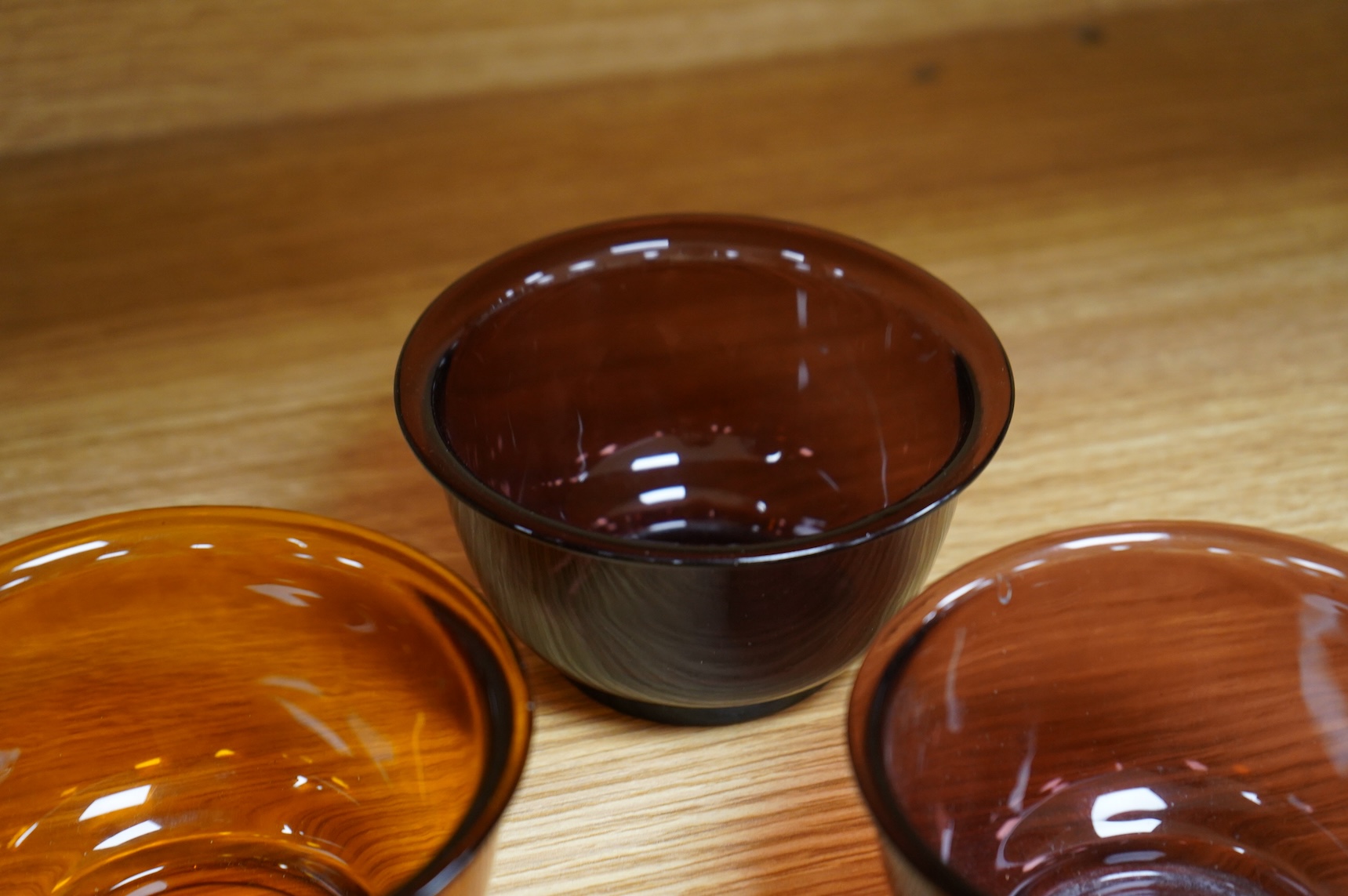 Two pairs of Chinese 'Peking' glass bowls, largest 11cm diameter